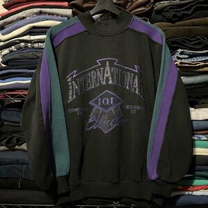 International Logo Crewneck Sweater - Black with Purple & Teal Accents